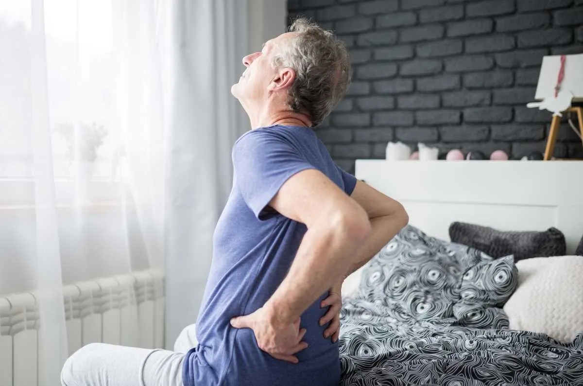 Why You Wake Up Stiff Every Morning: The Overnight Spinal Collapse No One Warns You About