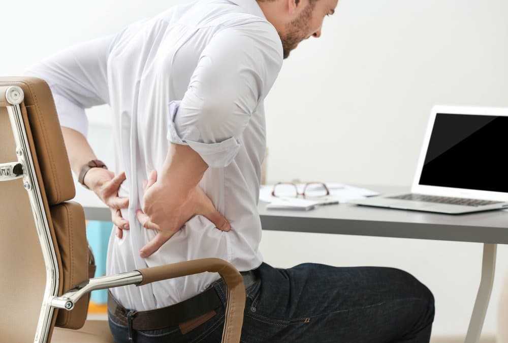 Why Sitting All Day Is Quietly Crushing Your Spine and What Happens When the Discs Start to Collapse